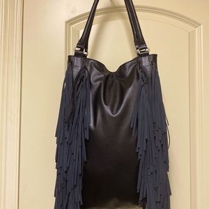 Beautiful black sexy shoulder bag! Used as an overnight bag!